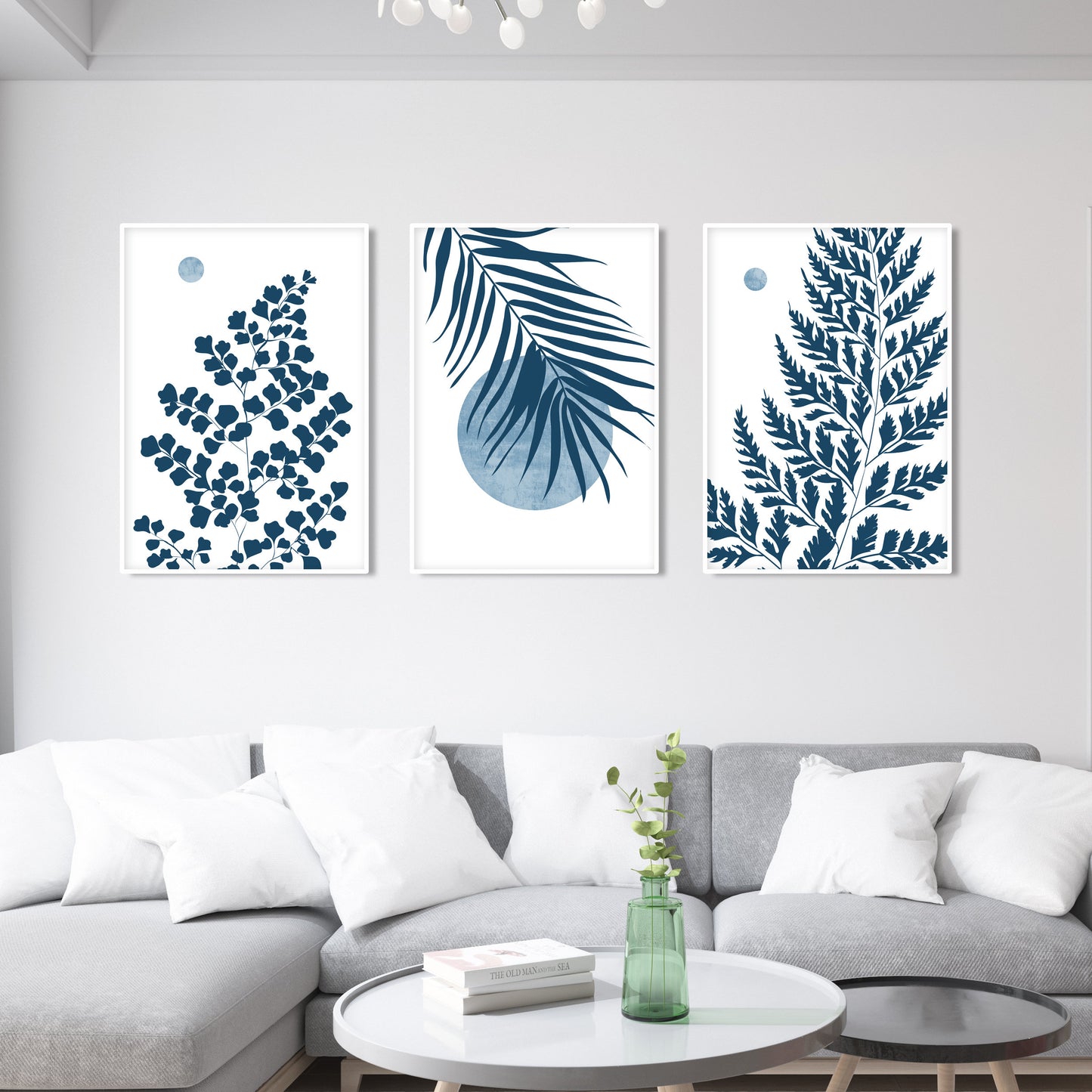 Large botanical wall art showcasing blue palm leaves, fern branches and tropical foliage artwork