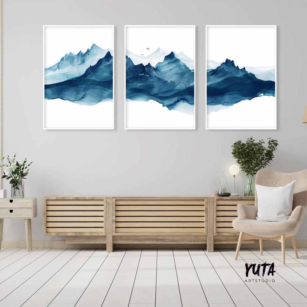 Blue mountain wall art set featuring watercolor alpine landscapes and layered peaks in a Scandinavian style interior