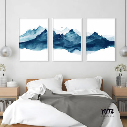Blue mountain wall art set featuring watercolor alpine landscapes and layered peaks in a Scandinavian style interior