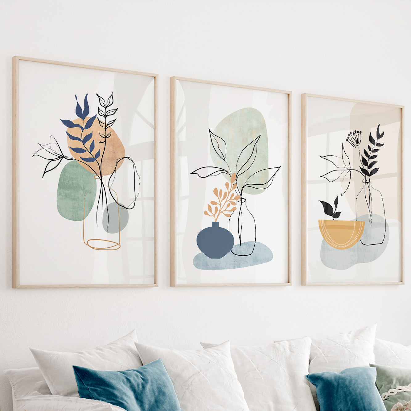 Abstract botanical wall art set of 3 featuring floral line drawings with modern minimalist vases