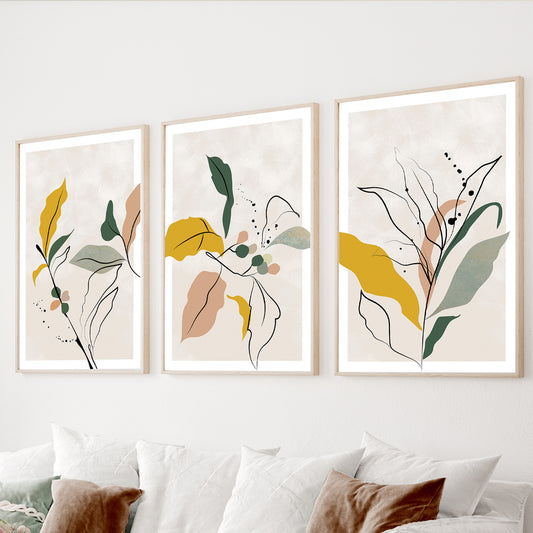 Abstract botanical wall art set of 3 featuring modern leaf illustrations in sage green and mustard yellow