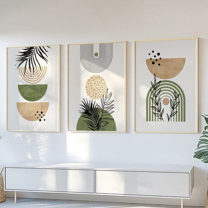 Set of three framed abstract botanical prints in earthy tones above a white console