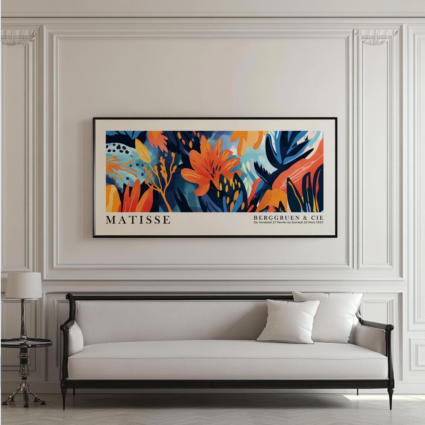 Vivid tropical floral Matisse-style artwork in a black frame hung above a classic sofa