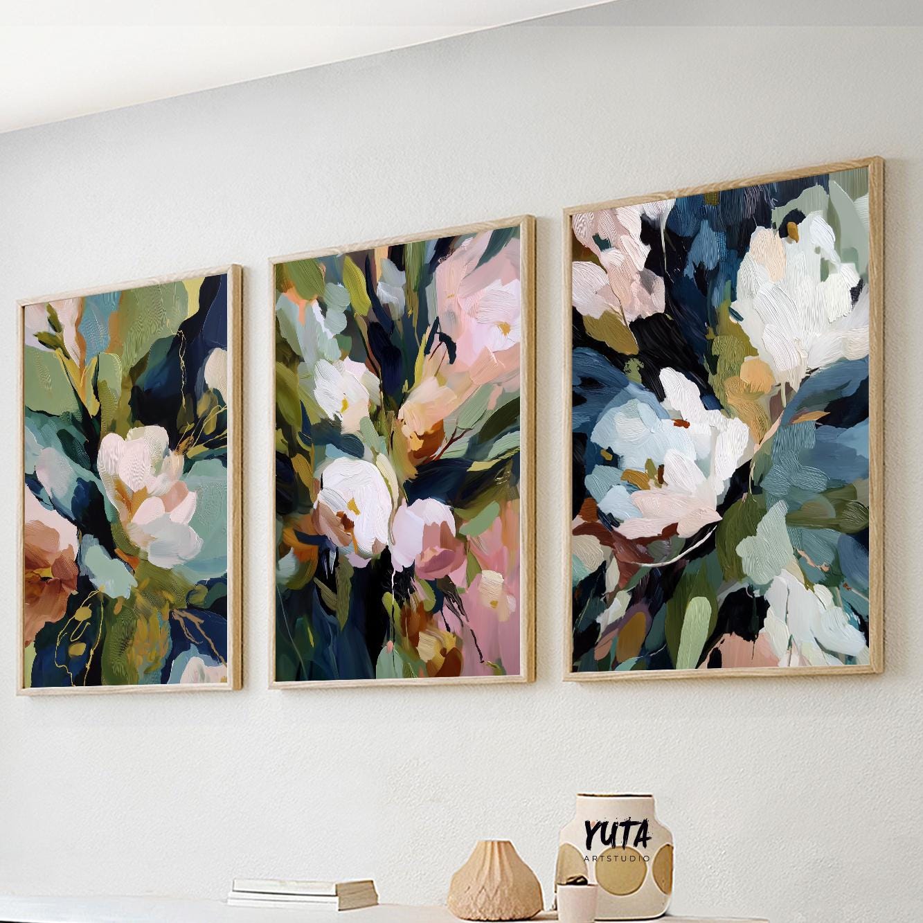 Abstract floral wall art set of 3 featuring white blossoms, soft blush accents and expressive blue-green botanical brushstrokes