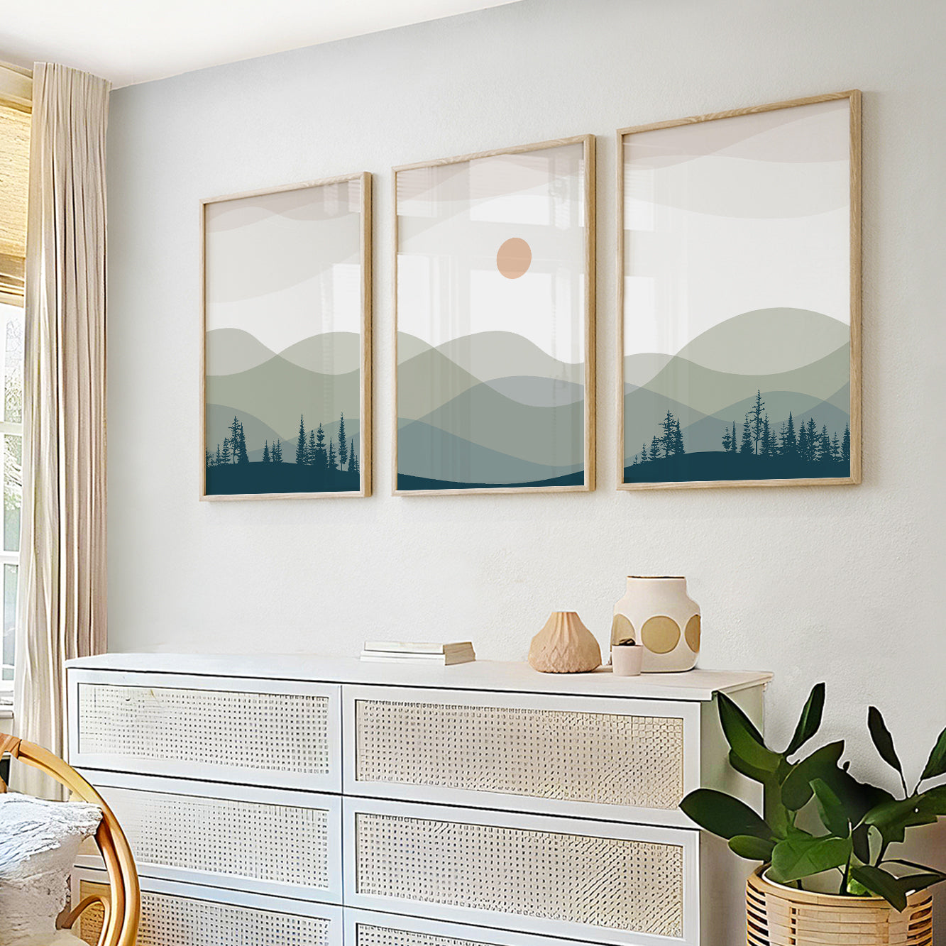 Modern landscape prints with rolling hills, forest silhouettes, and a subtle rising sun