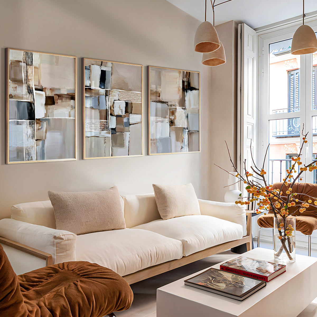Beige abstract wall art triptych with modern geometric shapes and subtle black accents in a warm neutral palette.