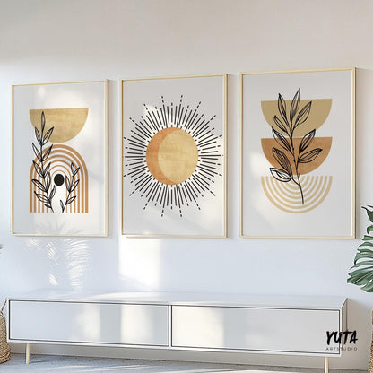 Trio of framed boho prints in terracotta beige above a sideboard for size reference