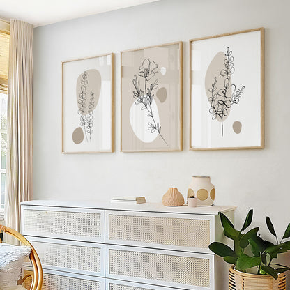 Minimalist botanical wall décor featuring elegant plant illustrations and organic abstract forms