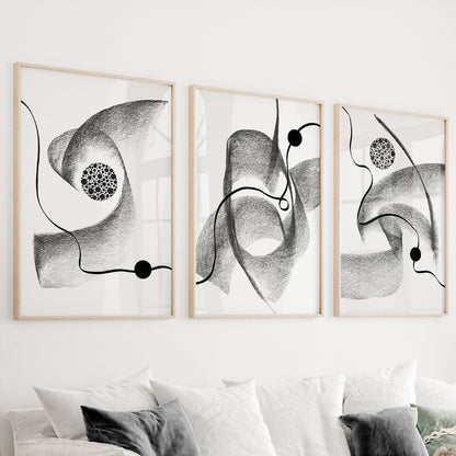 Black and white abstract wall art set of 3 featuring expressive charcoal textures and flowing line art