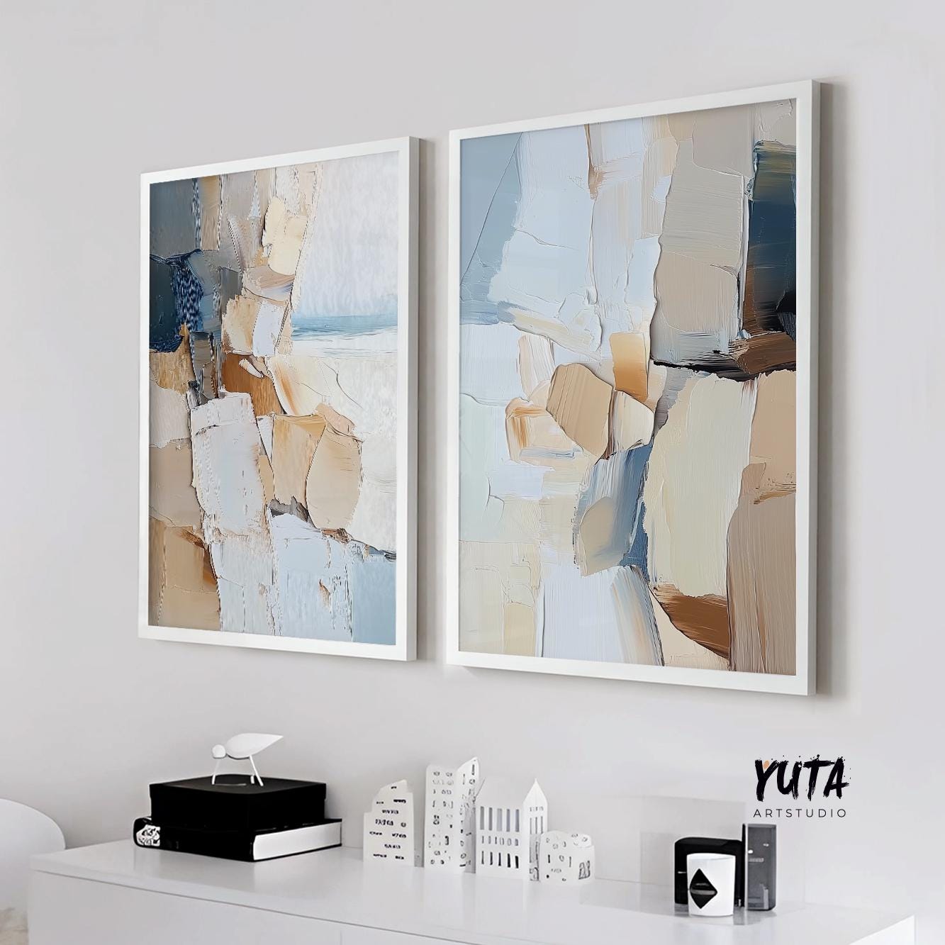 Two-piece neutral abstract art set in white frames arranged side by side on a pale wall