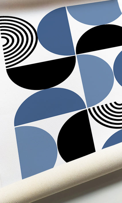Blue geometric gallery wall featuring modern abstract forms and clean graphic design