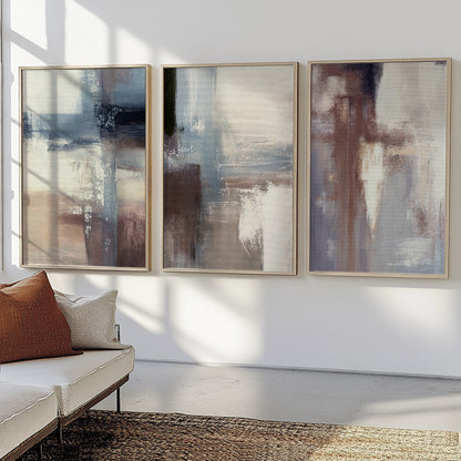 Modern abstract prints in dusty blue, beige, and taupe