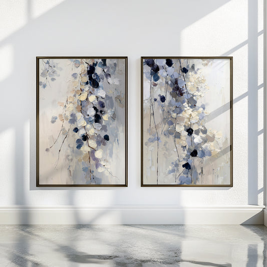 Blue floral wall art set of 2 featuring cascading abstract flowers in soft blue, navy, cream and beige.