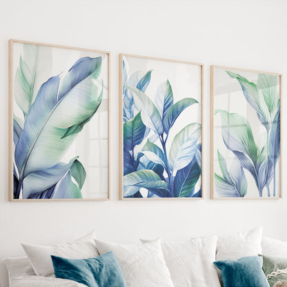 Blue green botanical wall art set of 3 featuring elegant tropical leaves in soft blue and sage green tones
