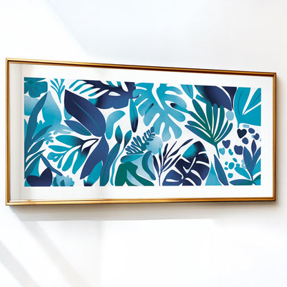 Abstract blue botanical leaves print in a gold frame against a white wall