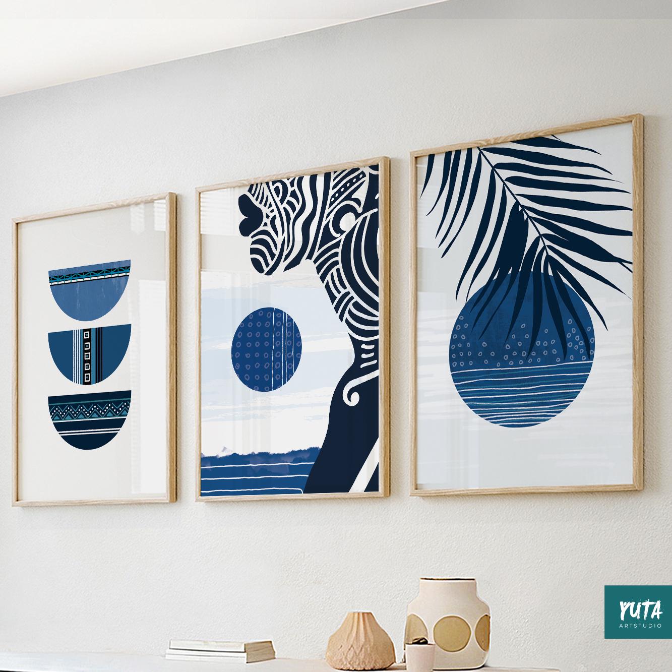Blue wall art set featuring abstract botanical forms, tropical leaves and geometric coastal inspired design