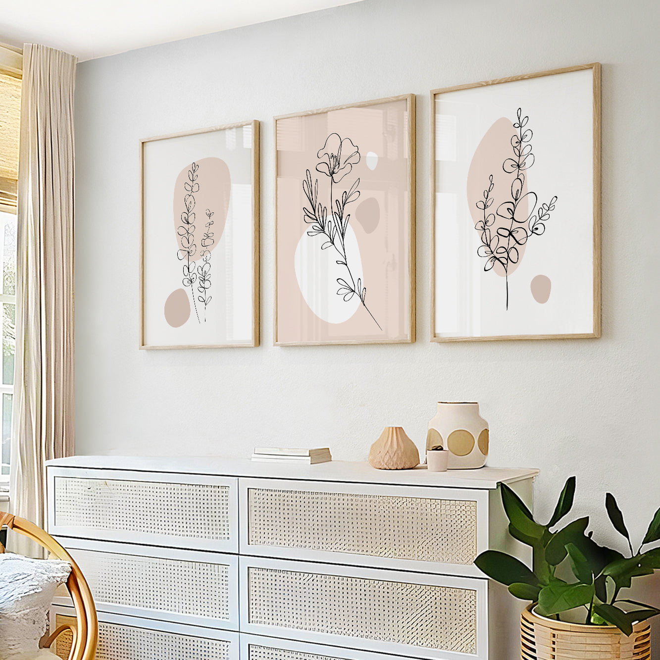 Contemporary botanical wall décor with floral line drawings and blush abstract shapes