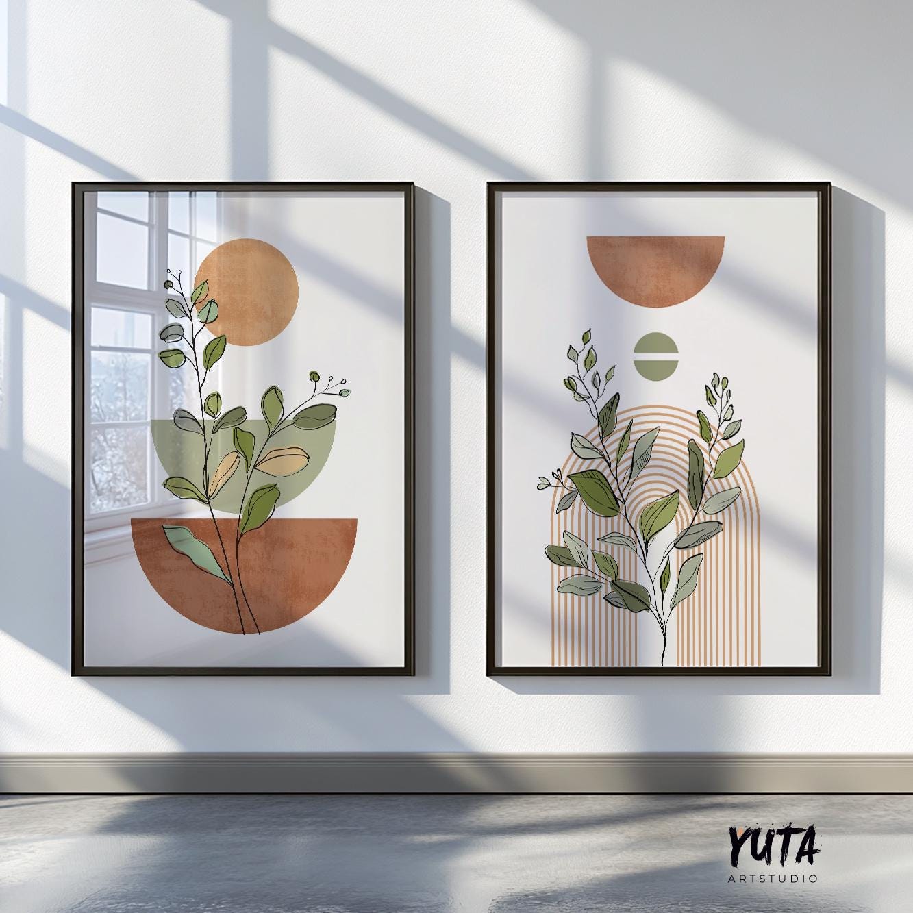 Abstract terracotta and beige botanical prints in black frames, sunlight casting shadows on the gallery wall