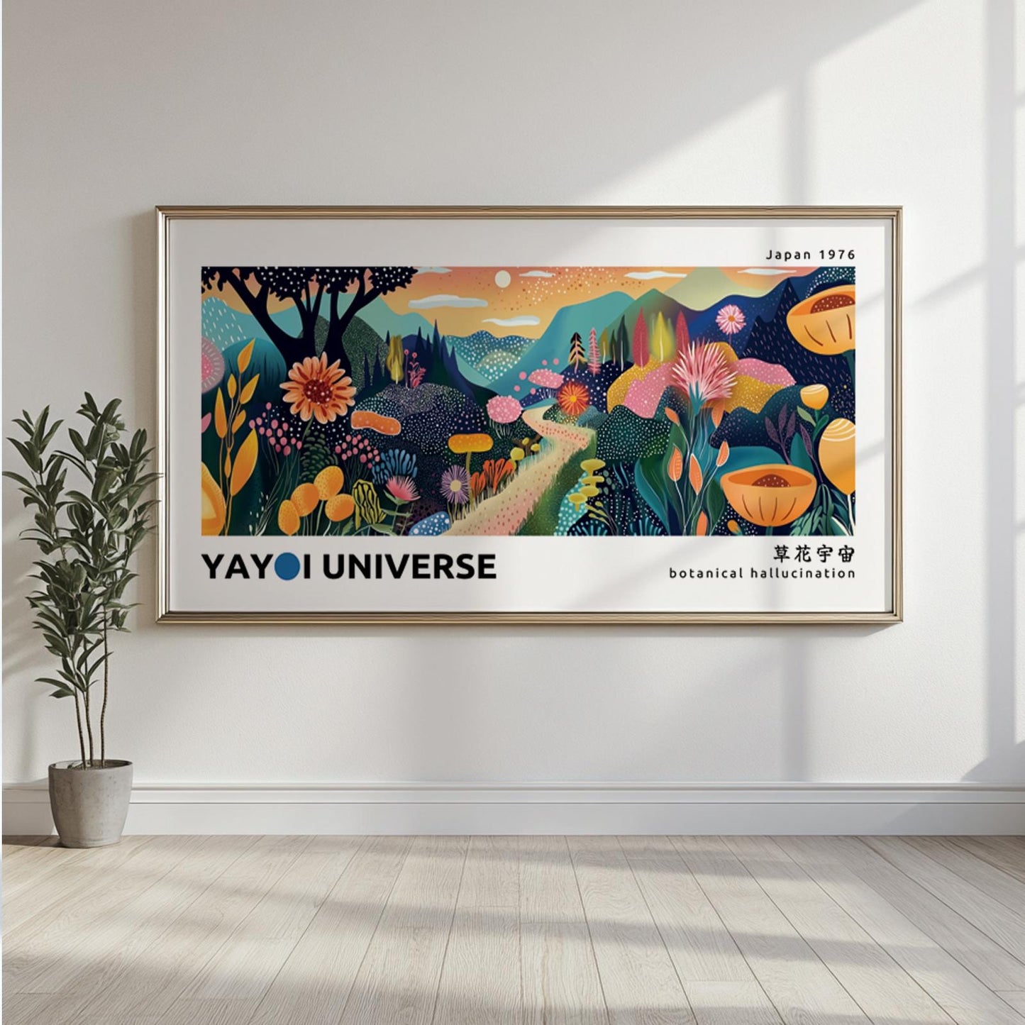 Framed abstract botanical mountains print above a light-colored sofa with natural sunlight.
