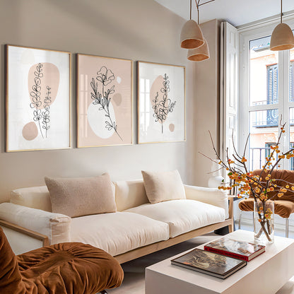 Organic Modern botanical gallery wall featuring minimalist floral illustrations on blush backgrounds