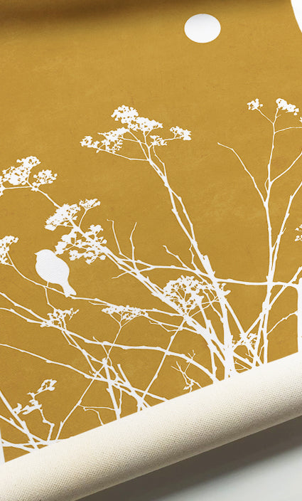 Botanical gallery wall with elegant floral silhouettes on textured mustard backgrounds