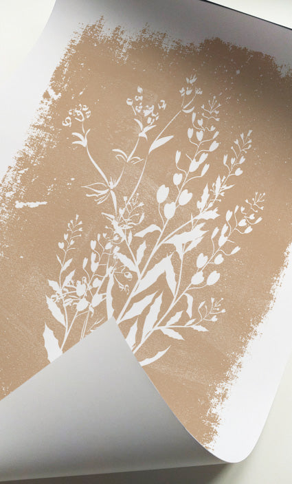 Modern botanical gallery wall featuring elegant wildflower silhouettes in warm beige colors