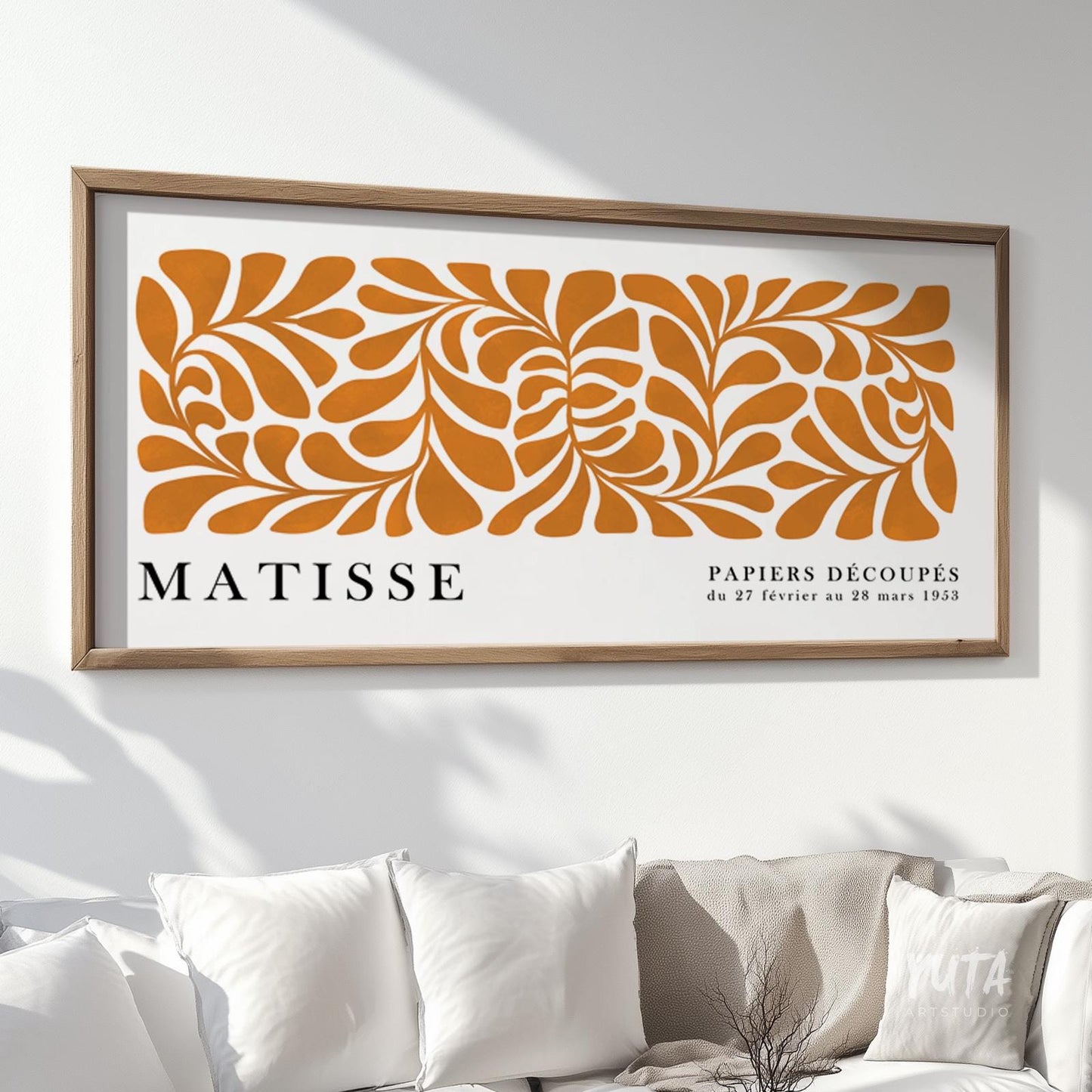 Botanical wall art featuring orange floral cutout patterns and Matisse inspired modern minimalist design