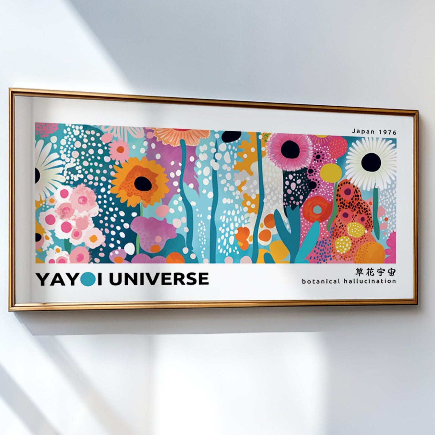 Panoramic abstract floral print with bold dots framed above a sunlit console.