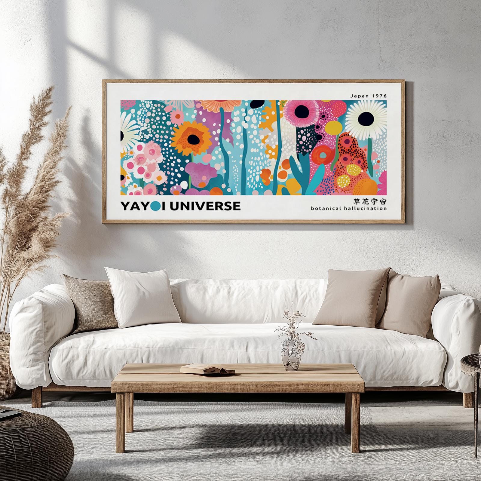Panoramic floral abstract print in wood frame shown above a modern white sofa for scale.
