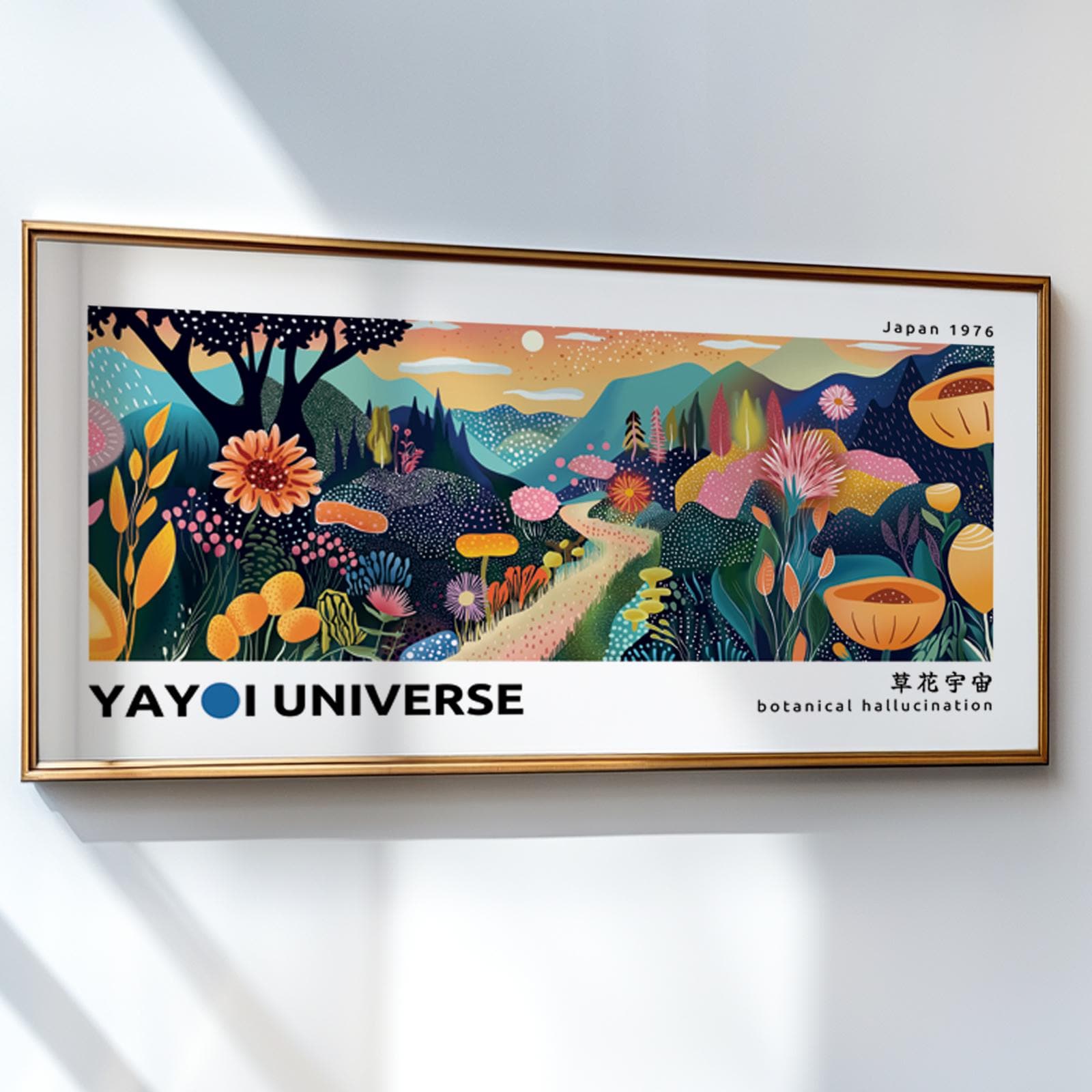 Framed abstract mountain landscape with vibrant botanical patterns hung on a white wall.