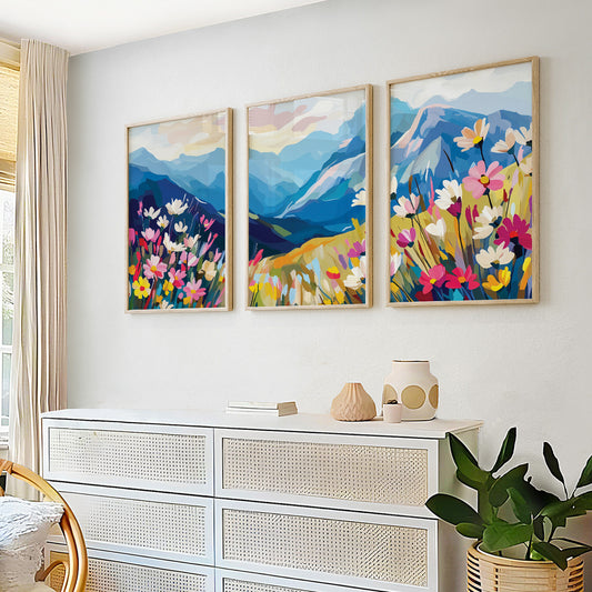 Colorful mountain wall art set of 3 featuring a vibrant wildflower meadow and blue mountain landscape.