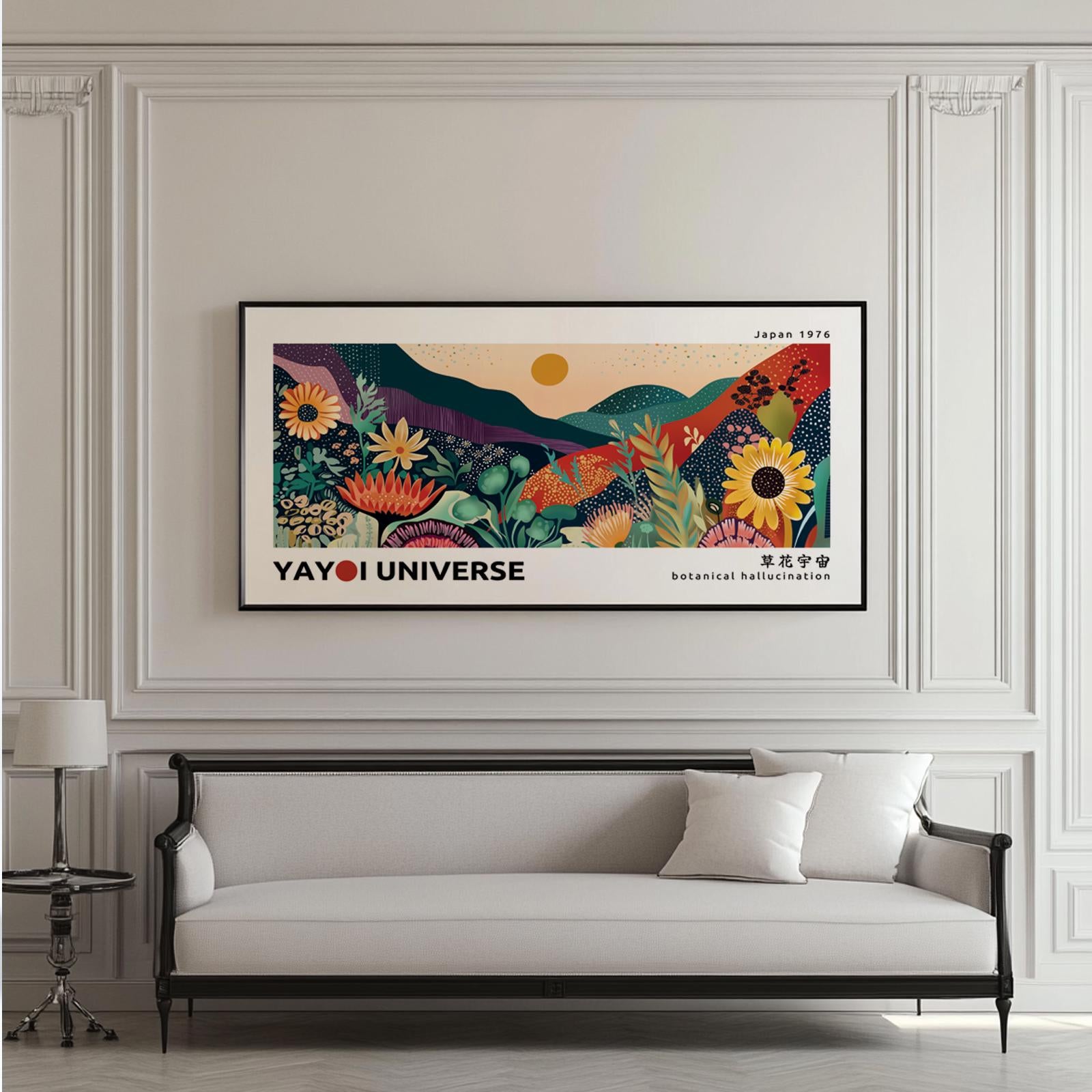 Framed colorful botanical landscape print centered above a light sofa in sunlit room