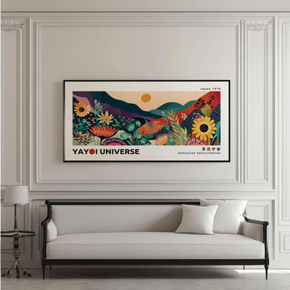 Framed colorful botanical landscape print centered above a light sofa in sunlit room
