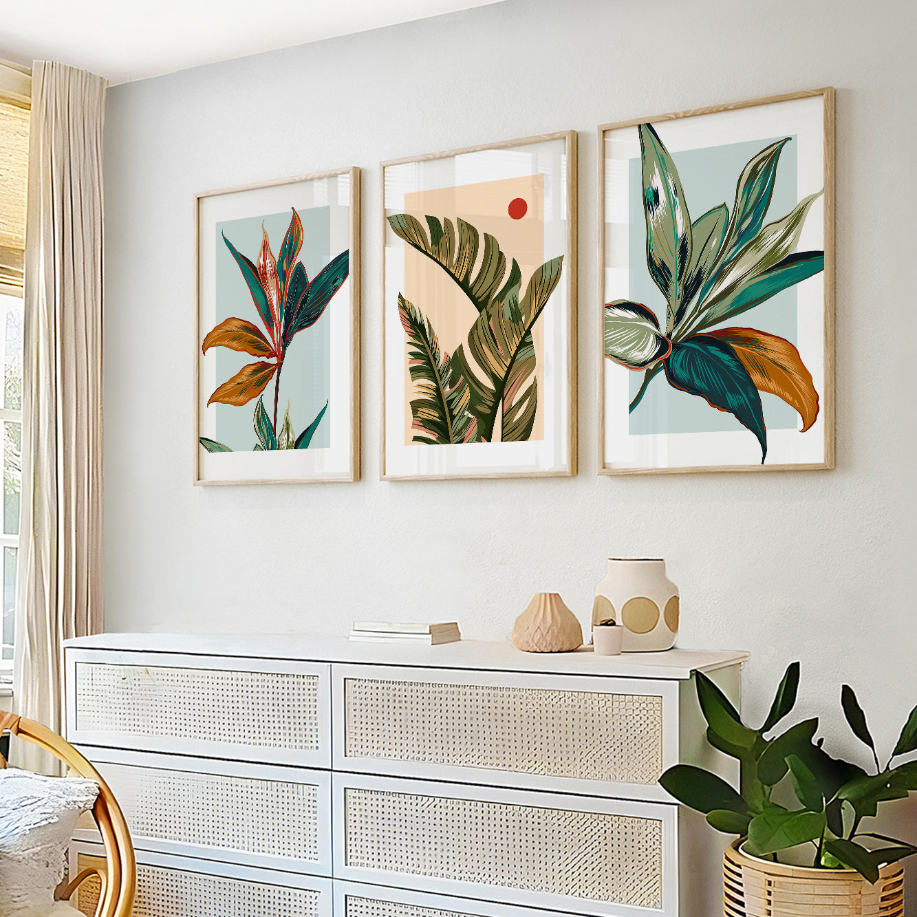 Colorful tropical leaf wall art with teal, olive green, terracotta, and mustard botanical designs