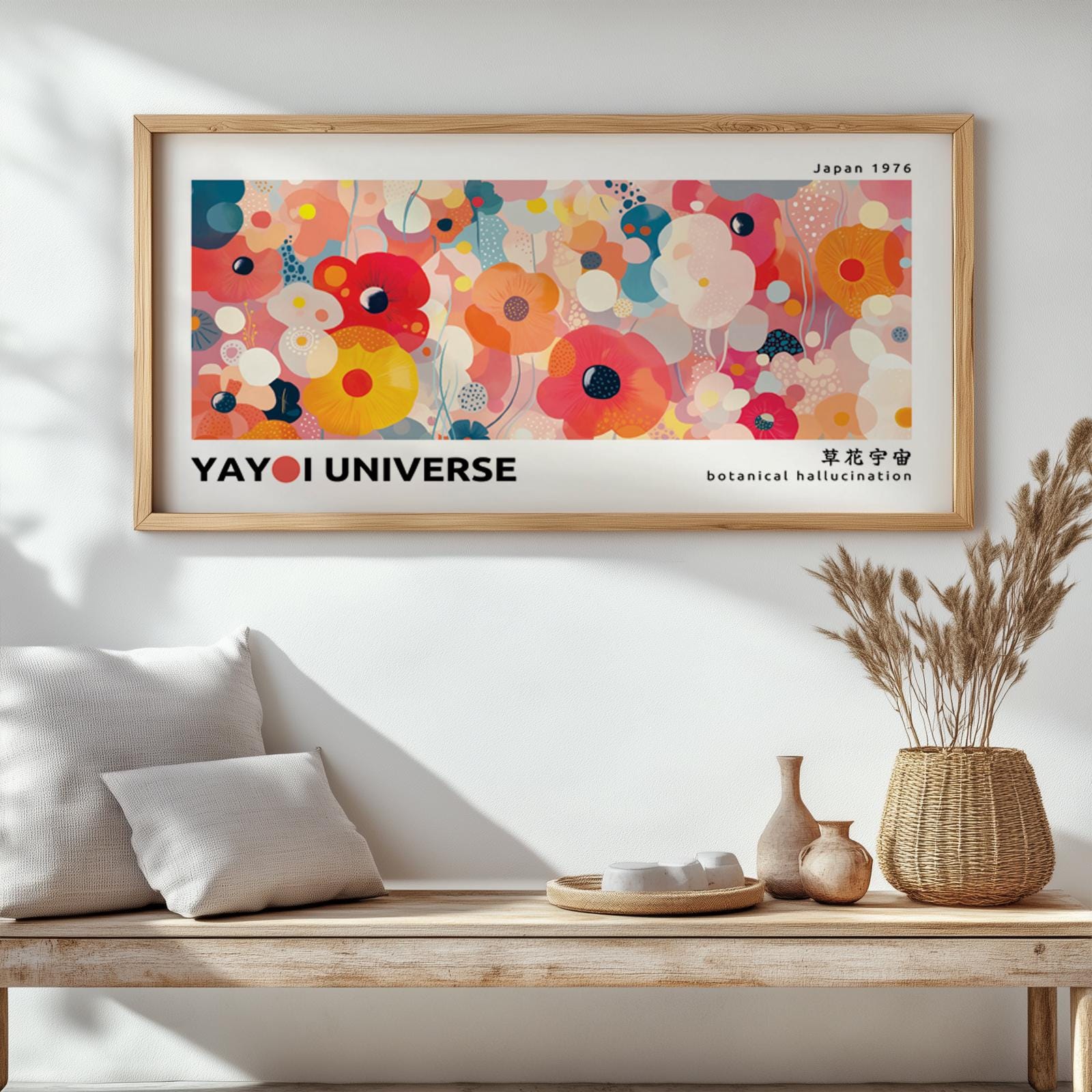 Framed abstract floral art in vibrant colors displayed above a natural wood bench.