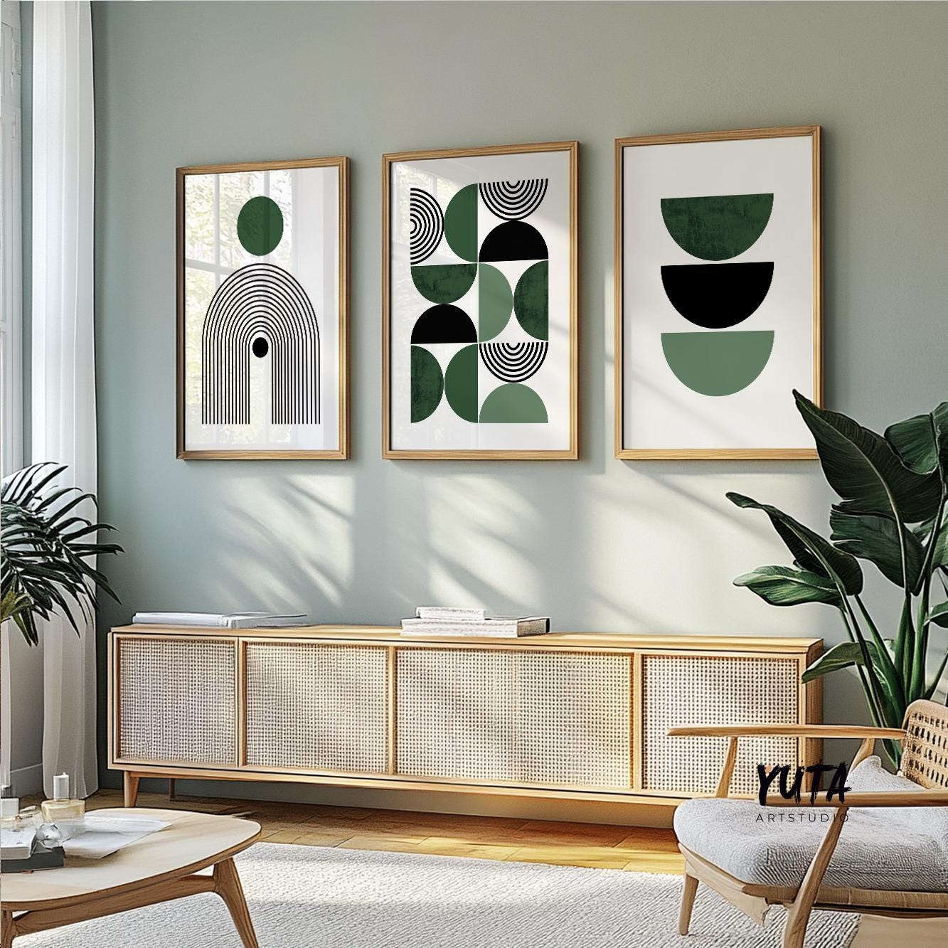 Abstract geometric Bauhaus art set in natural wood frames arranged above a woven sideboard