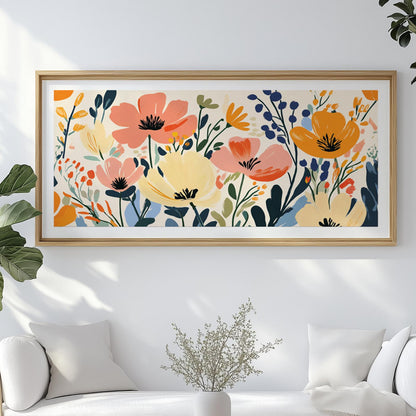 Panoramic floral artwork in a natural wood frame featuring bold abstract wildflowers