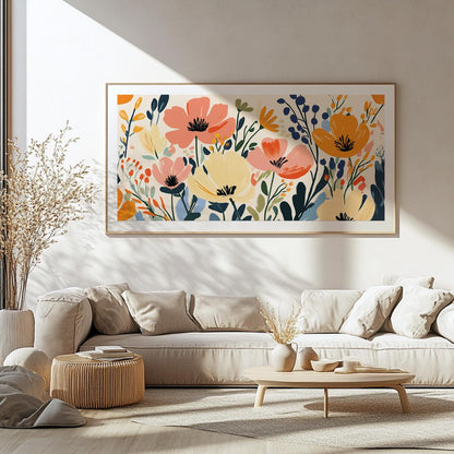 Panoramic floral wall art with bold, abstract wildflowers framed above a light console.