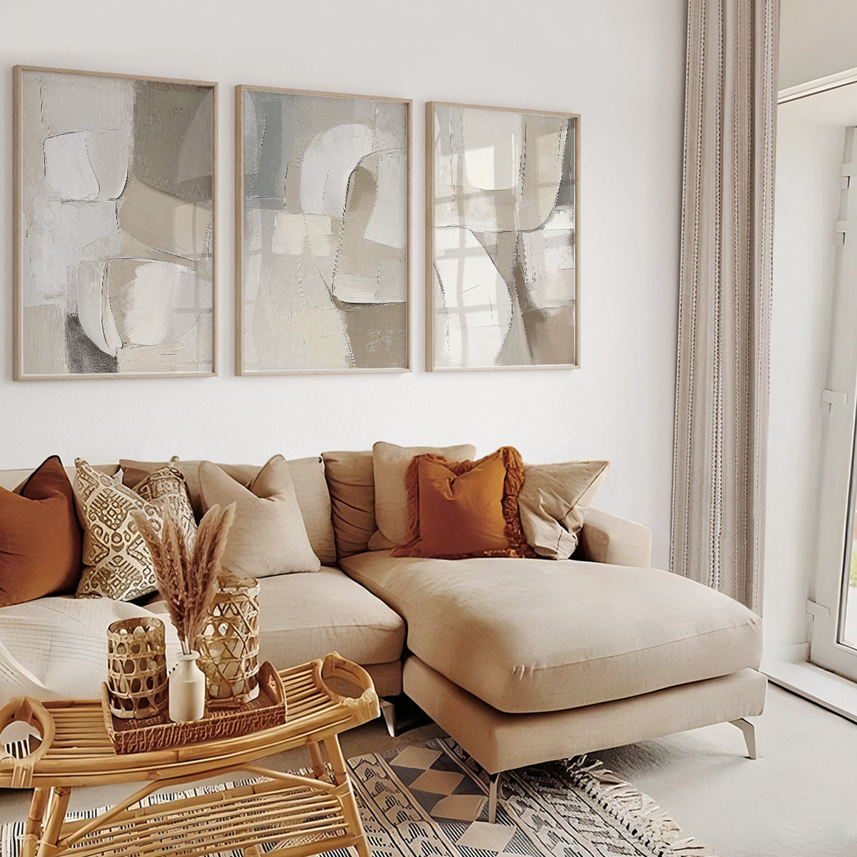 Cream neutral wall art set of 3 featuring minimalist abstract shapes in ivory, greige and warm taupe.