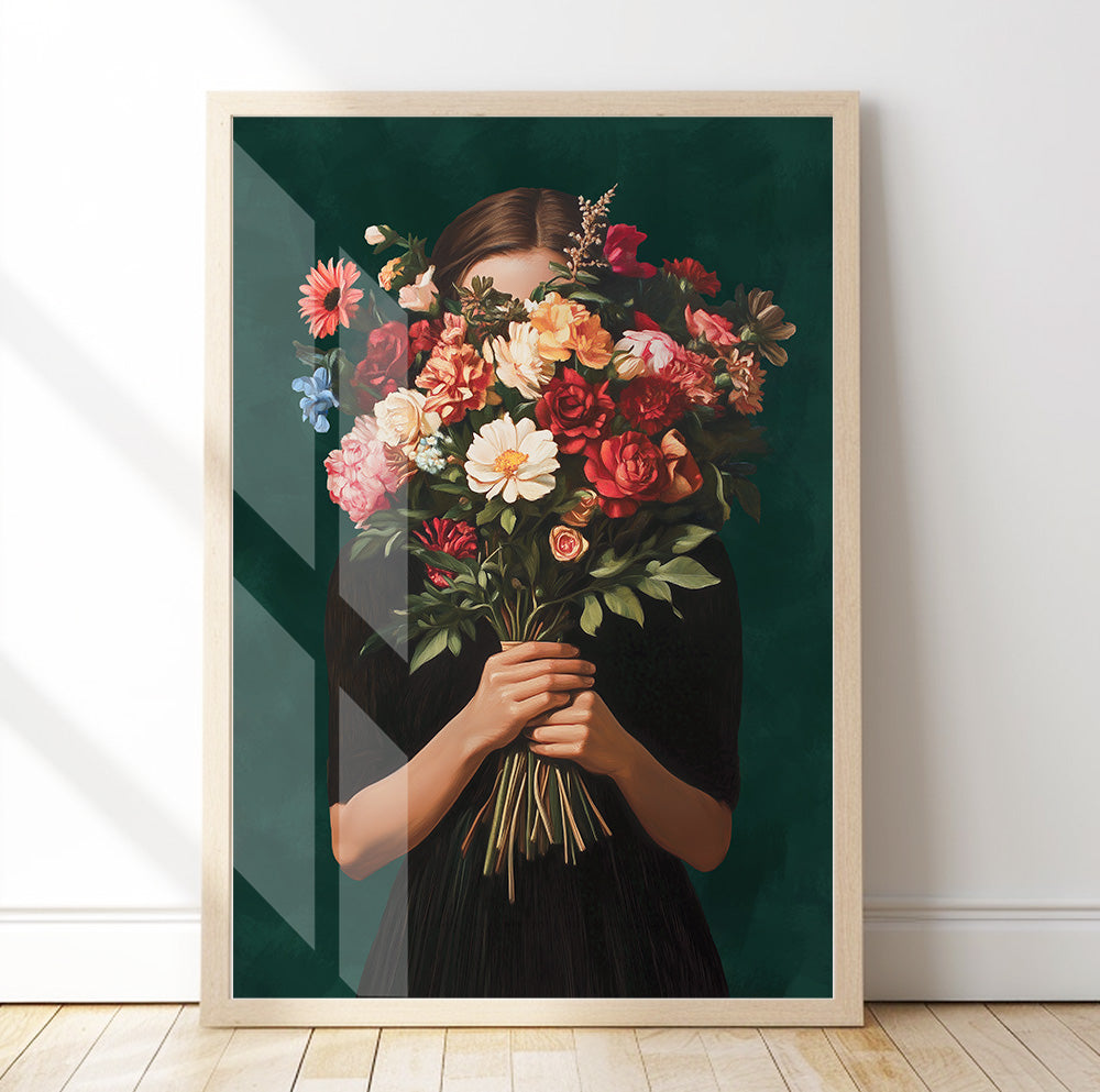 Dark green floral wall art featuring a woman holding a vibrant bouquet of red, peach and white flowers