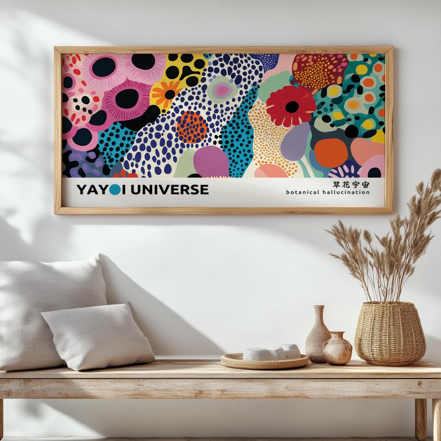 Colorful abstract floral artwork in a light wood frame styled above a wooden console.