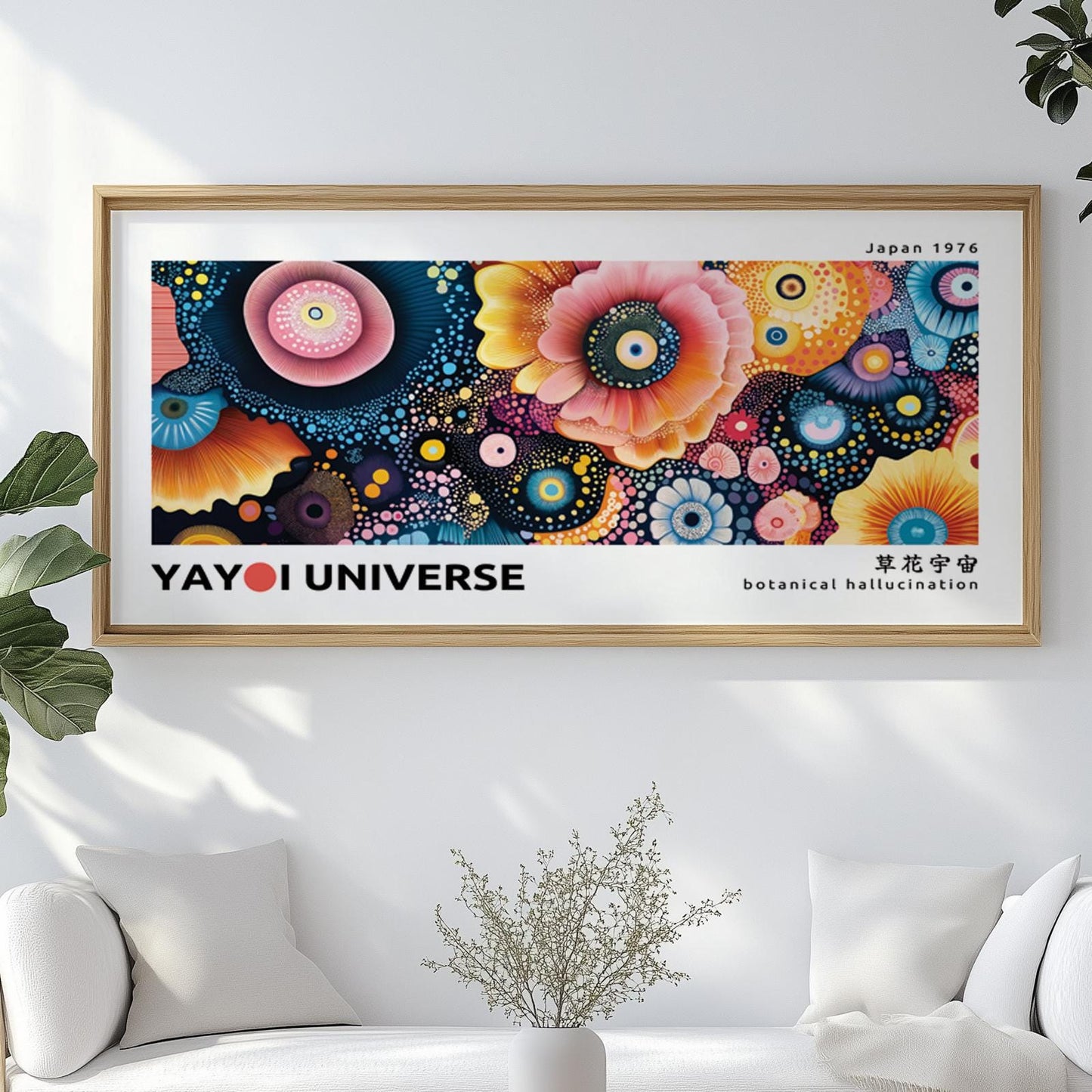 Large abstract floral artwork with colorful dotted flowers in a light wood frame above a sofa