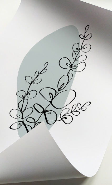 Contemporary botanical wall art with floral illustrations in soft green and neutral colors