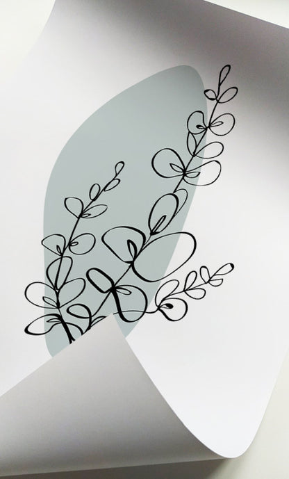 Contemporary botanical wall art with floral illustrations in soft green and neutral colors