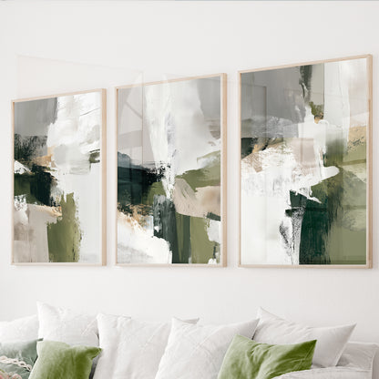 Green abstract wall art set of 3 featuring expressive brushstrokes in olive, forest green, white, beige and soft gray.