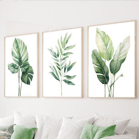 Green botanical wall art set of 3 featuring tropical monstera and banana leaves in soft watercolor tones