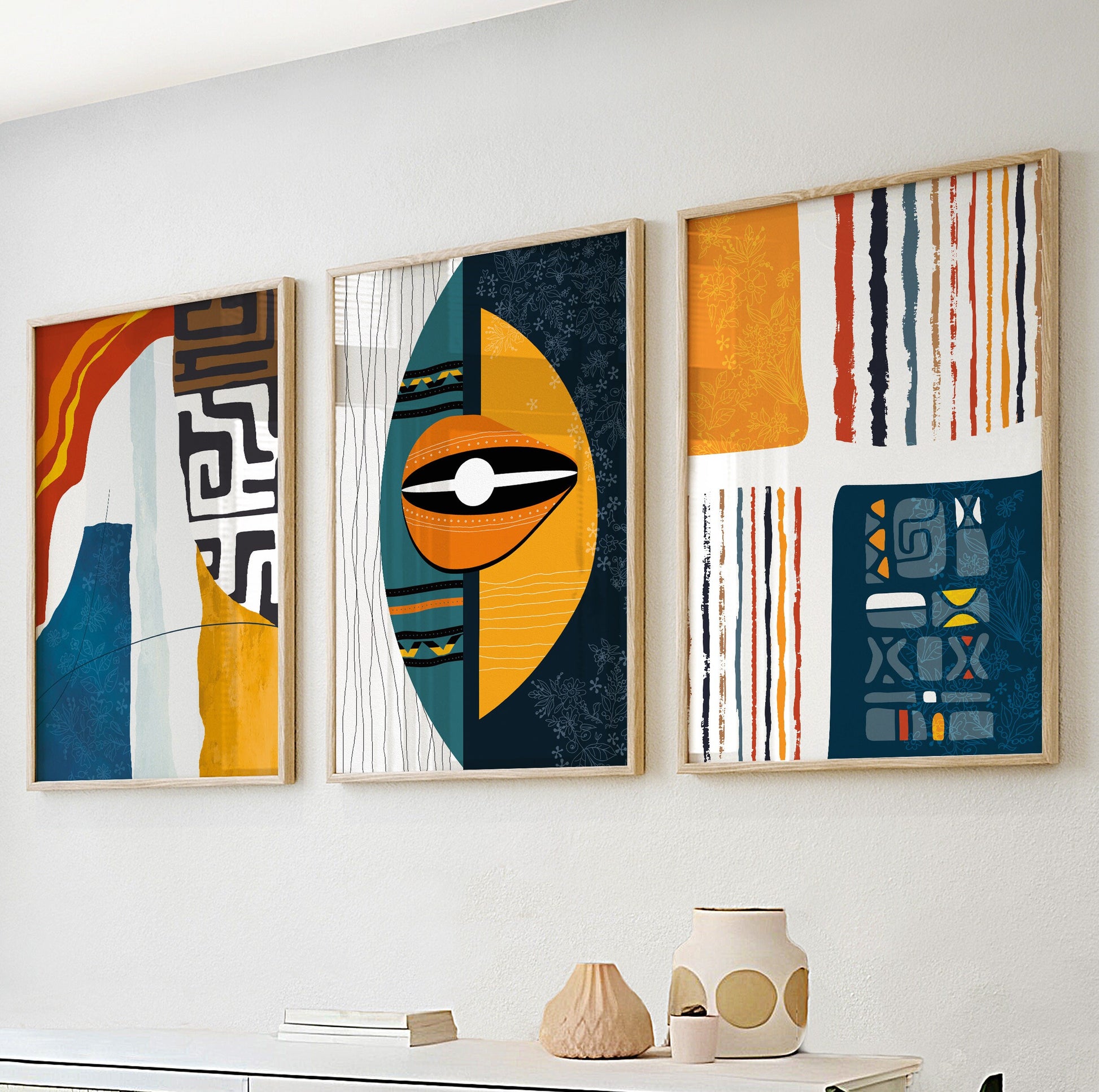Abstract African art triptych with vibrant colors and ethnic elements, ideal for a stylish boho living room wall display.