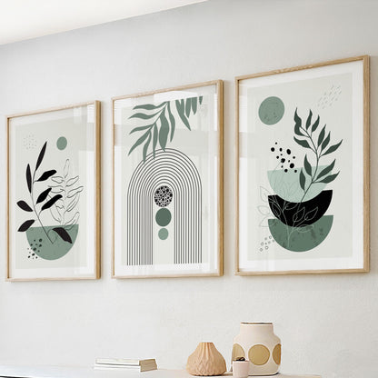 Three framed botanical abstract prints in sage green, 40x50 cm sizing reference above shelf