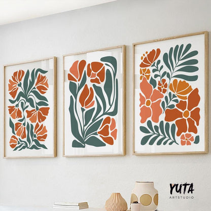 Boho floral triptych art in natural wood frames shown above a console for scale reference