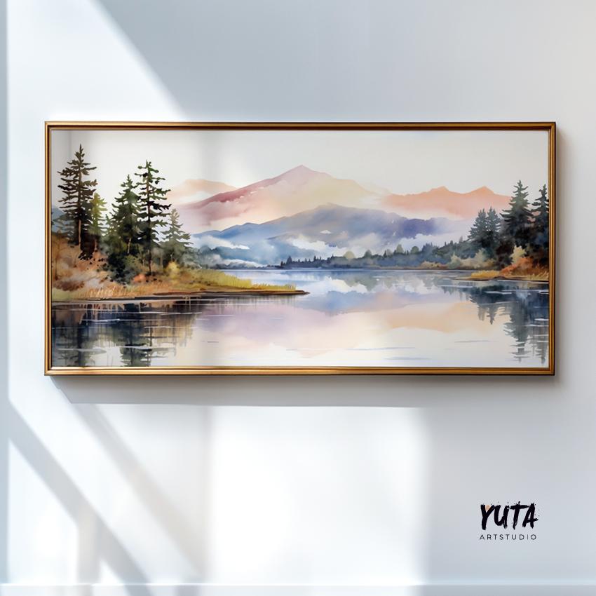 Panoramic pastel mountain landscape in a light wood frame hung above a white console.